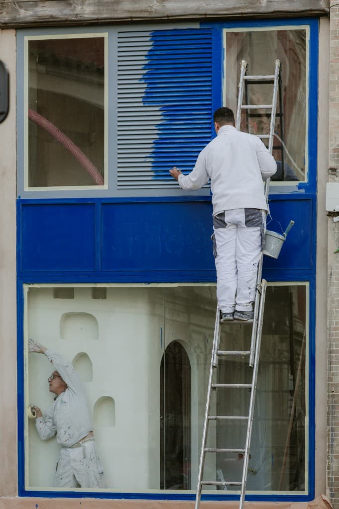 Painter applying paint
